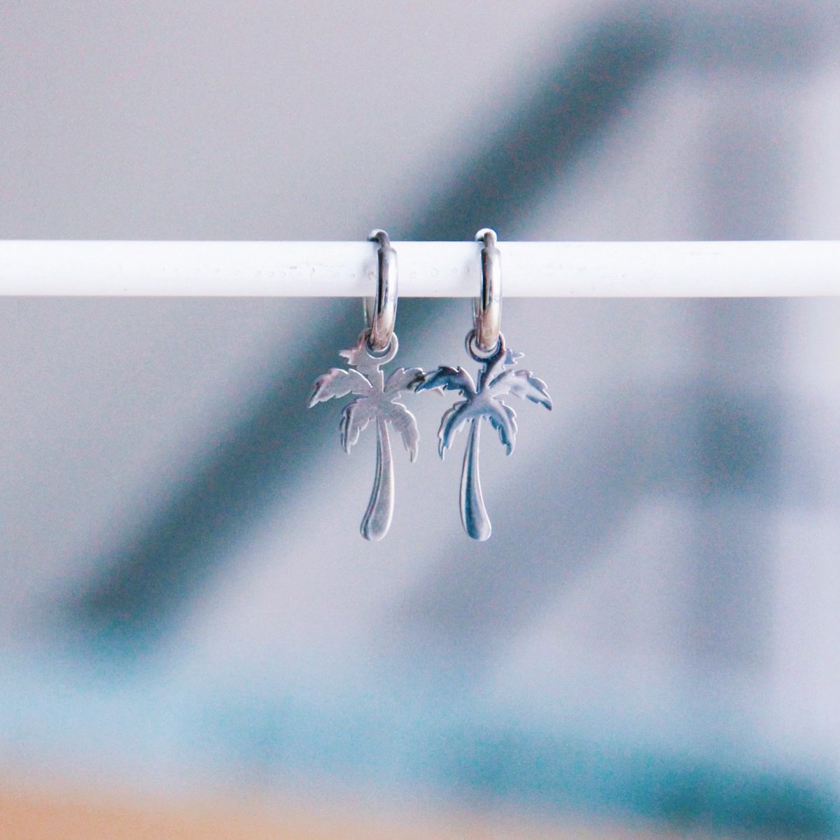 Stainless steel hoop earrings with palm tree - silver